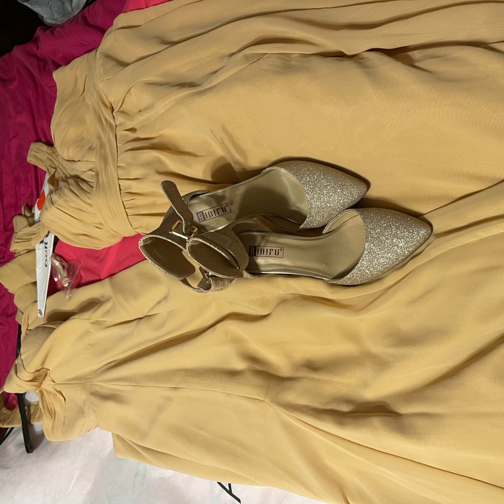 Size 6 dress and jumper. Size 6 heels. Worn one time
